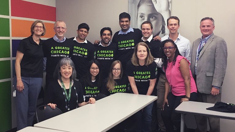 The McKinsey volunteers with the Greater Chicago Food Depository executive team