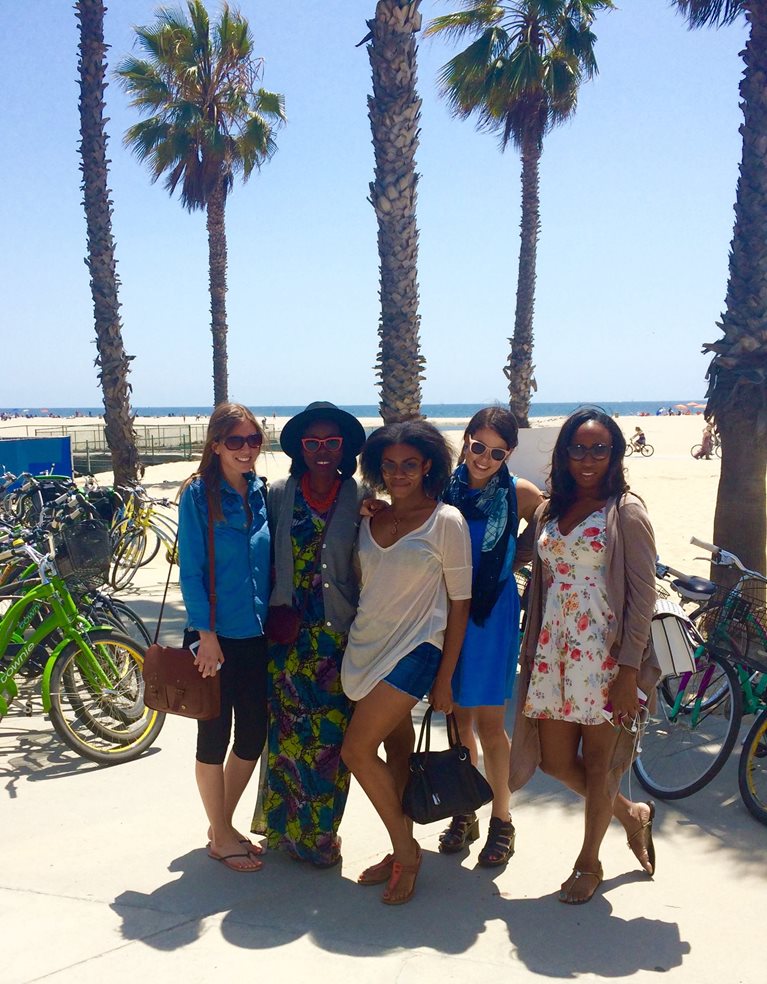 Mayowa with friends on the beach