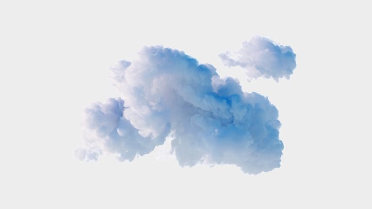 A fluffy cumulus cloud with blue toned shadows set against a gray background. 