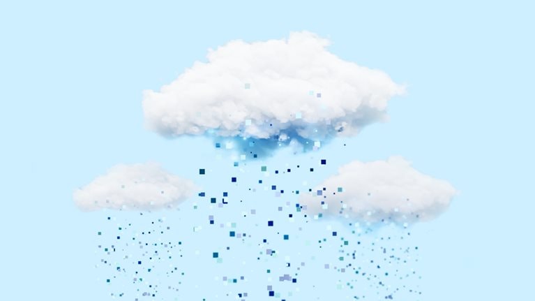 Against a backdrop of light blue, three fluffy white clouds release a robust rain of blue pixels.